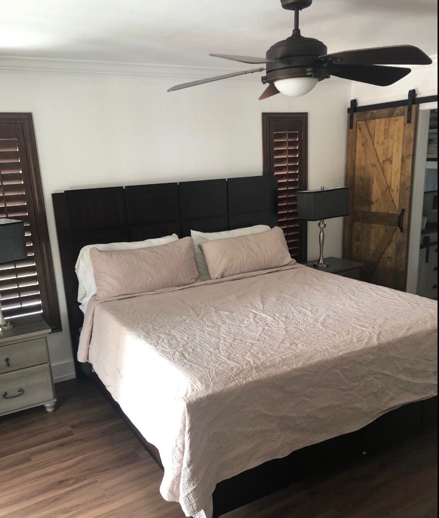 Eric's House master bedroom king bed with ceiling fan