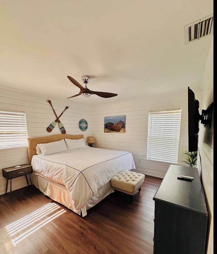 Eric's House guest bedroom king bed shiplap walls