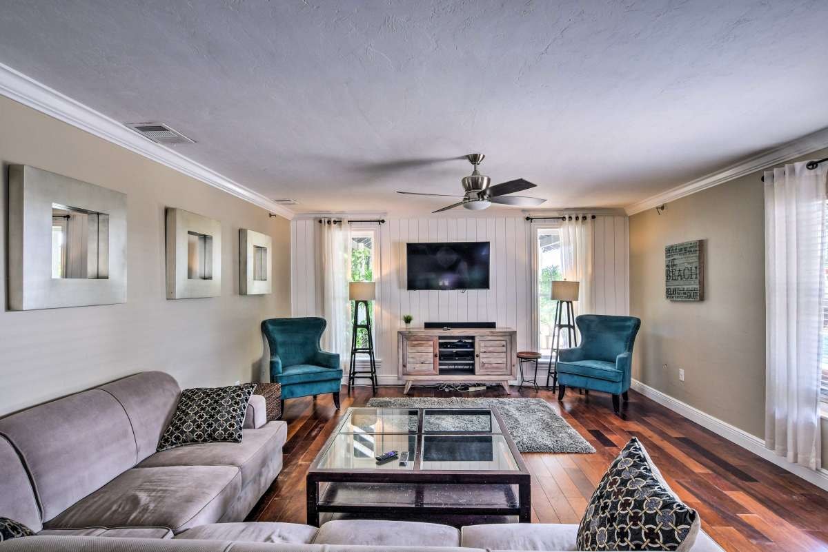 Cozy sitting room with teal accent chairs