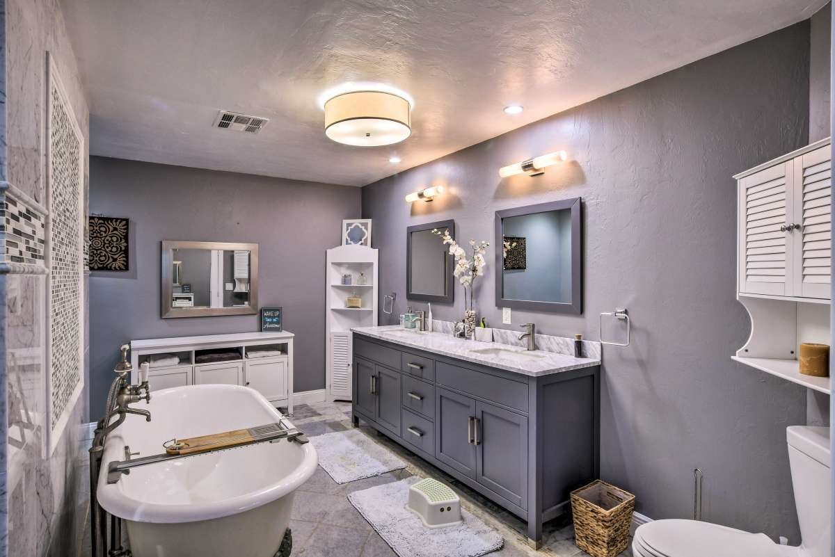 Master bathroom with clawfoot tub and double vanity