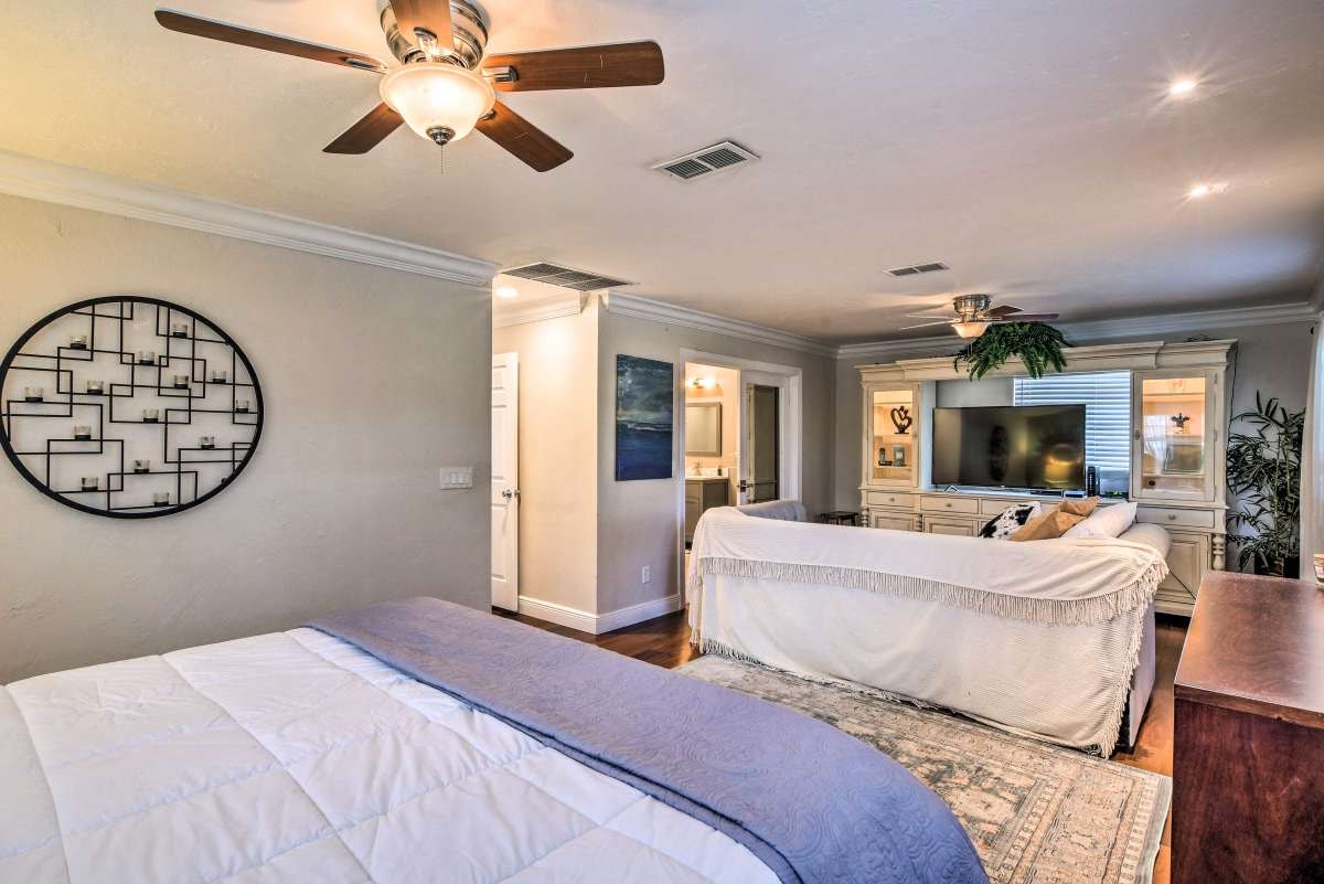 Master bedroom with king bed and sitting area