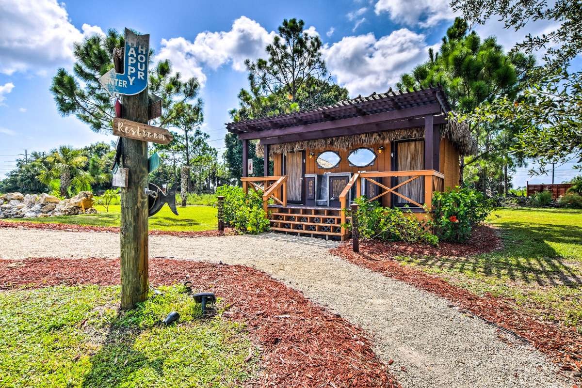 Outdoor restroom tiki cabin on the grounds