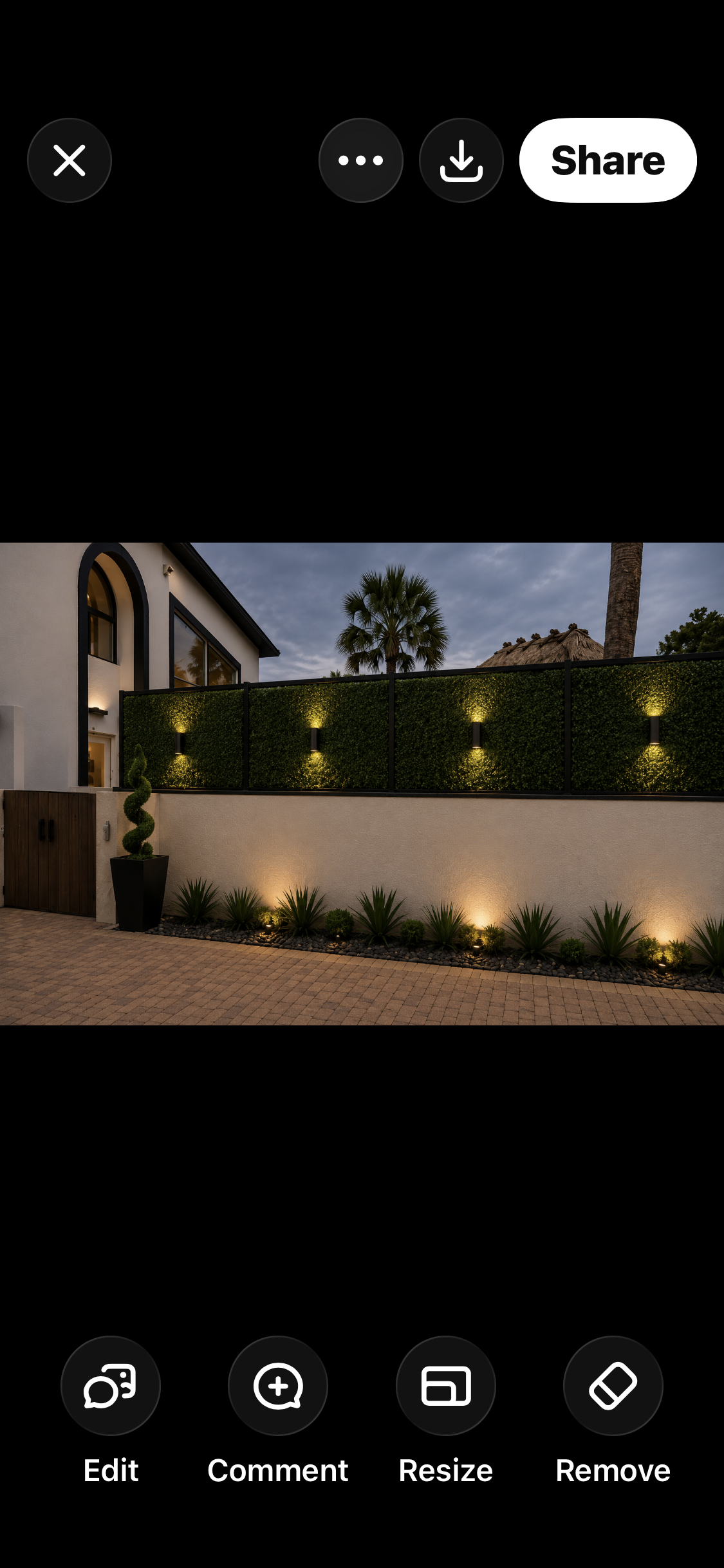 North Shore home exterior with illuminated landscape